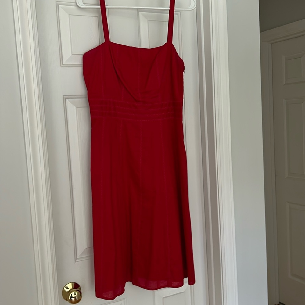 Light summer sundress with fun stitching detail.